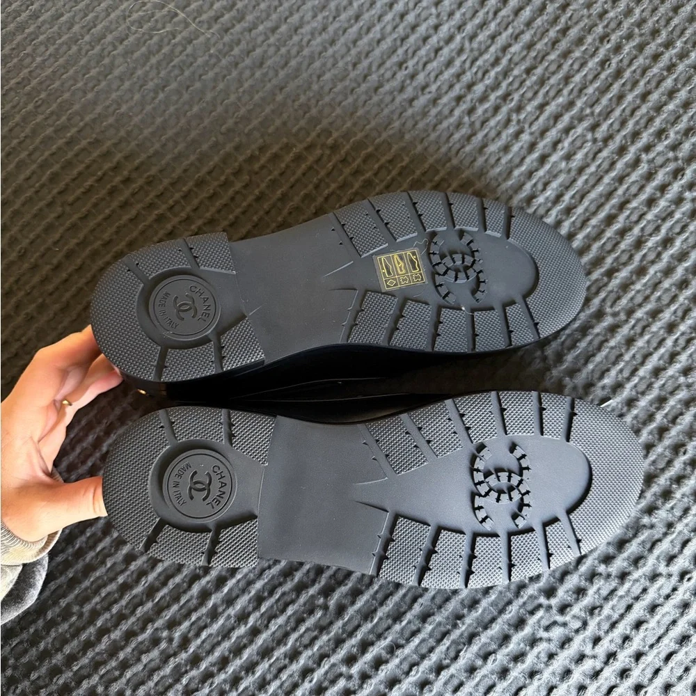 CHANEL Black Leather Women’s Shoes with Gold Accents